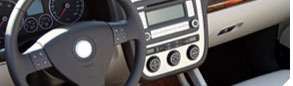 photo of a steering wheel and dash in an automobile